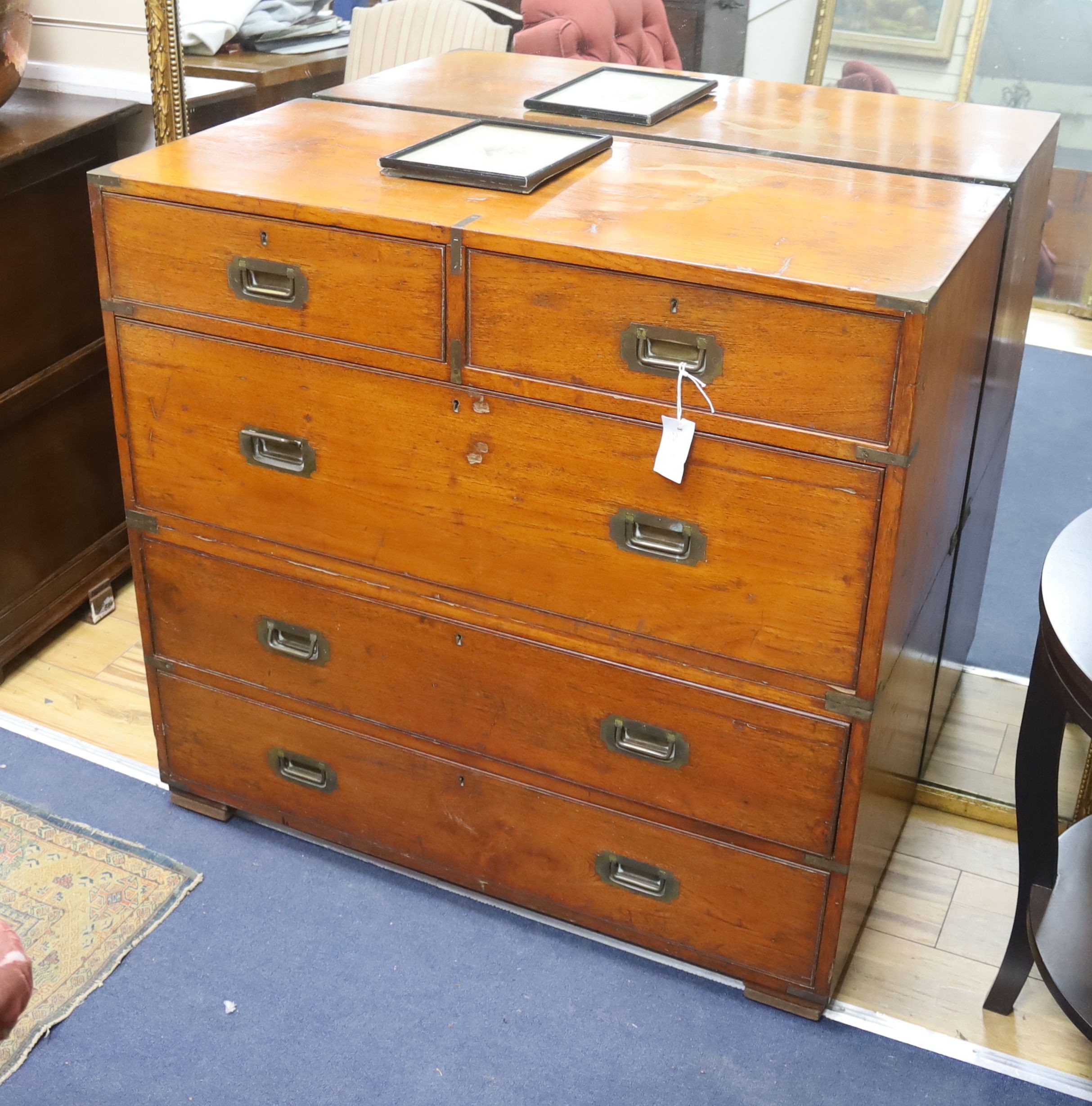 A Victorian camphorwood Army & Navy brass mounted two part military chest, width 99cm, depth 46cm, height 93cm